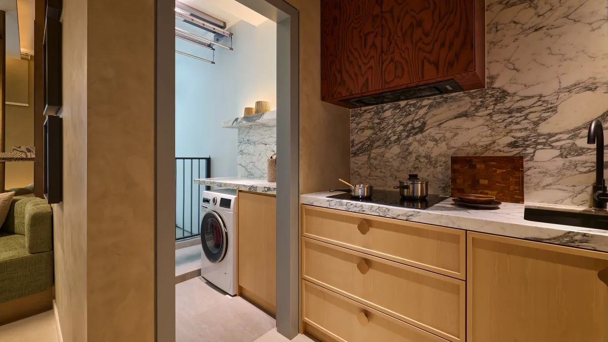 Type A kitchen running through to the laundry